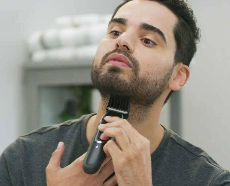 Man trimming beard